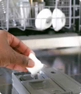 Man Cleaning the Dishwasher
